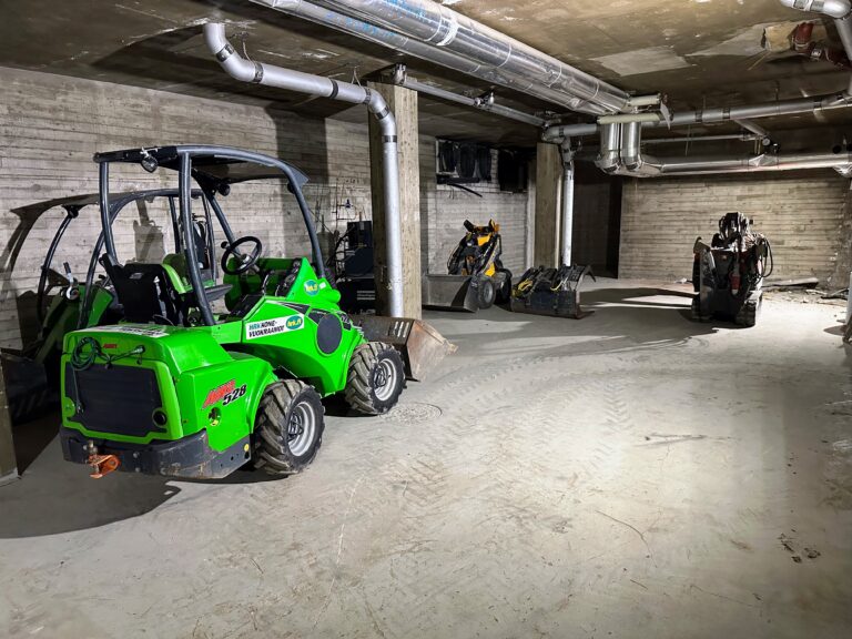 In the picture, driveable machines used for cleaning the swimming pool indoors.