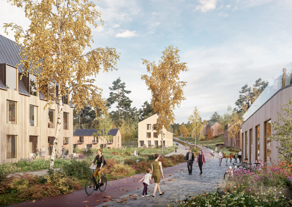 Observation picture: View along the new main collector street to the west. On the right is a kindergarten and on the left is a 3-story residential building. The buildings have wooden facades. It's a sunny autumn day and the leaves have started to fall from the trees. People are walking back and forth in front of the kindergarten.