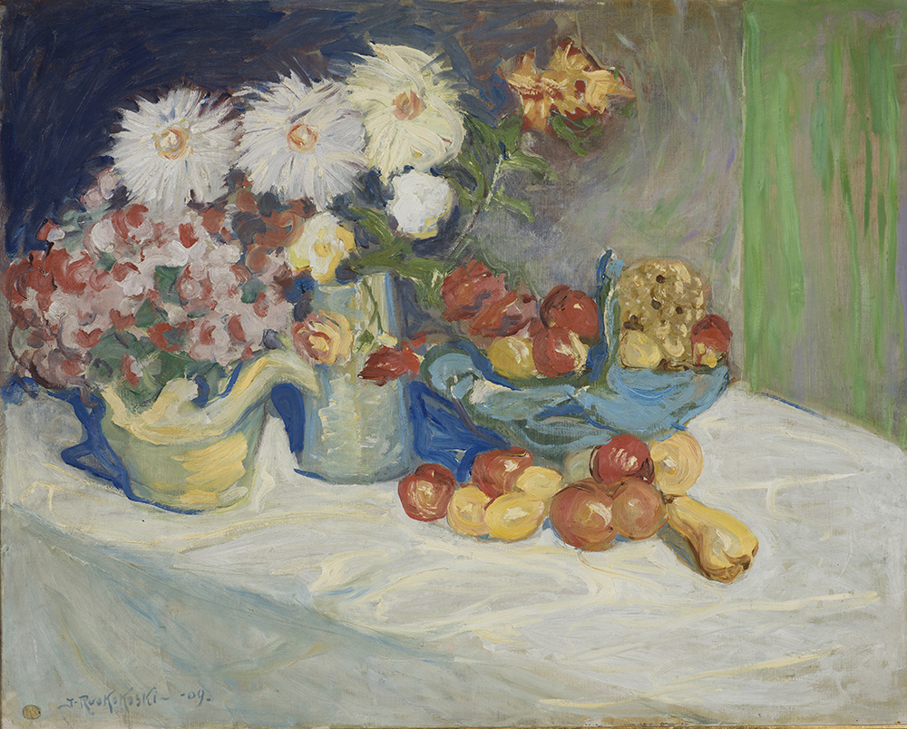 Jalmari Ruokokosken teos jossa kuvattuna värikkäitä hedelmiä ja kukkia aseteltuna pöydälle.